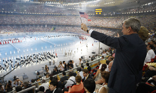 President George W. Bush and Mrs. Laura Bush acknowledge the entrance of the U.S. athletes into China's National Stadium in Beijing, Friday, Aug. 8, 2008, for the Opening Ceremonies of the 2008 Summer Olympics. The President called the event "spectacular and lots of fun." White House photo by Eric Draper