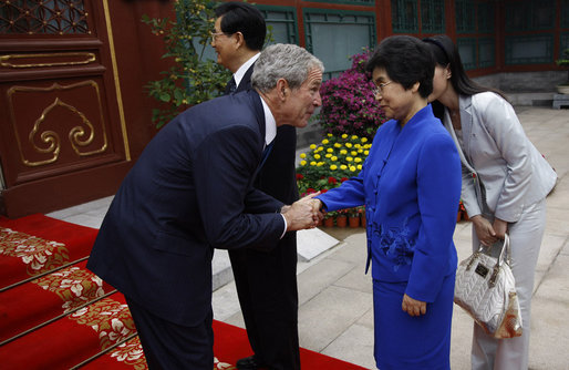 President George W. Bush shakes hands with Madame Liu Yongquig, wife of China's President Hu Jintao, following President Bush's visit and meeting Sunday, Aug. 10, 2008, to Zhongnanhai, the Chinese leaders compound in Beijing. White House photo by Eric Draper