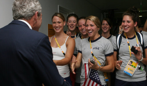 President George W. Bush greets members of the U.S. Olympic Swimming Team Sunday, Aug. 10, 2008, backstage at the National Aquatics Center in Beijing. White House photo by Shealah Craighead