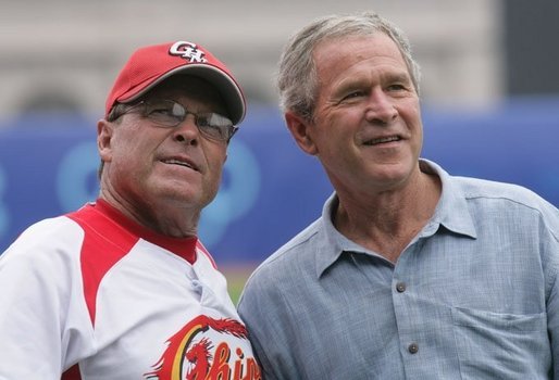 President George W. Bush talks with the Chinese Olympic men's baseball team manager, Jim Lefebvre, prior to a practice game with the U.S. Olympic men's baseball team Monday, Aug. 11, 2008, at the 2008 Summer Olympic Games in Beijing. White House photo by Chris Greenberg