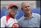 President George W. Bush talks with the Chinese Olympic men's baseball team manager, Jim Lefebvre, prior to a practice game with the U.S. Olympic men's baseball team Monday, Aug. 11, 2008, at the 2008 Summer Olympic Games in Beijing. White House photo by Chris Greenberg