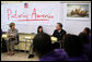 Mrs. Laura Bush participates in a classroom discussion Thursday, Aug. 14, 2008, at the Edna Karr High School in New Orleans, where the National Endowment for the Humanities' Picturing America program is discussed. The Picturing America program is a collection of American art offered to schools and public libraries to help educators teach American history and culture through art. White House photo by Shealah Craighead