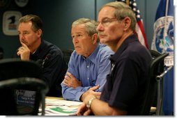 President George W. Bush, joined by Federal Emergency Management Agency Administrator David Paulison, left, and Deputy Administrator Harvey Johnson, right, participates in a briefing on preparations for Hurricane Gustav, at the FEMA National Response Center, Sunday, August 31, 2008 in Washington, DC. White House photo by Chris Greenberg