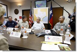 President George W. Bush is joined by FEMA Administrator Secretary David Paulison, left, Texas Governor Rick Perry and Texas National Guard Lt. General Charles Rodriguez, right, during a briefing Monday, Sept. 1, 2008 at the Texas Emergency Operations Center in Austin, Texas, for the most recent update on Hurricane Gustav. White House photo by Eric Draper