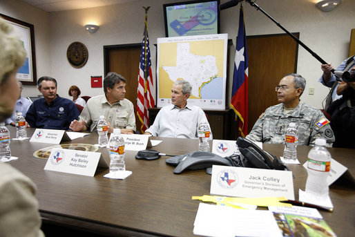 President George W. Bush is joined by FEMA Administrator Secretary David Paulison, left, Texas Governor Rick Perry and Texas National Guard Lt. General Charles Rodriguez, right, during a briefing Monday, Sept. 1, 2008 at the Texas Emergency Operations Center in Austin, Texas, for the most recent update on Hurricane Gustav. White House photo by Eric Draper