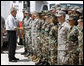 President George W. Bush meets military personnel Monday, Sept. 1, 2008 at the Alamo Regional Command Reception Center at Lackland Air Force Base in San Antonio, Texas, after attending a briefing on the response preparation for Hurricane Gustav. White House photo by Eric Draper