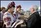 Vice President Dick Cheney is welcomed by Ukrainian youth in traditional dress Thursday, Sept. 4, 2008, in Kiev, the third stop on trip through ex-Soviet republics to reinforce U.S. support for the young democracies following Russian aggression in Georgia. White House photo by David Bohrer