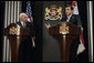 Vice President Dick Cheney looks on as Georgian President Mikheil Saakashvili delivers a statement Thursday, Sept. 4, 2008, following the leaders' meeting at the presidential office in Tbilisi. "Together with our partners in Europe, America and elsewhere, we will rebuild Georgia," the Georgian leader said in response to recent conflict with Russia, adding, "the light of freedom can never be extinguished in Georgia; the spirit and will of my nation, the resolve of my government, are stronger than ever before." White House photo by David Bohrer