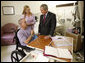 President George W. Bush talks with U.S. Army Brig. Gen. Dr. Charles William Fox, Jr. (Retired) and wife, Jan, of Leesburg, Va. during a visit Tuesday, Sept. 9, 2008, with wounded military personnel at Walter Reed Army Medical Center, in Washington, D.C. General Fox, CEO of Project Hope, was injured by an IED while helping to build a state-of-the-art cancer treatment facility for children in Basra. White House photo by Eric Draper