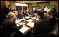 President George W. Bush is briefed on Hurricane Ike Thursday, Sept. 11, 2008, in the Situation Room of the White House. The massive storm is predicted to make landfall within the next 48 hours. White House photo by Eric Draper