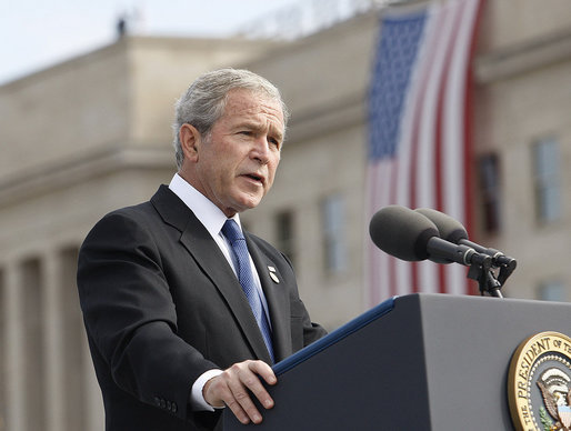 President George W. Bush delivers his remarks during the dedication ceremony of the 9/11 Pentagon Memorial Thursday, Sept. 11, 2008, at the Pentagon in Arlington, Va. In his remarks President Bush said, "The Pentagon Memorial will stand as an everlasting tribute to 184 innocent souls who perished on these grounds. The benches here bear each of their names. And beneath each bench is a shimmering pool filled with the water of life -- a testament to those who were taken from us, and to their memories that will live on in our hearts." White House photo by Eric Draper