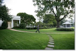 President George W. Bush walks from the Oval Office to make a statement to the press concerning Hurricane Ike Saturday, Sept. 13, 2008, after a video teleconference briefing in the Situation Room with officials from the National Hurricane Center, the Department of Homeland Security and FEMA. White House photo by Chris Greenberg