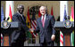 President George W. Bush shakes hands with President John Agyekum Kufuor of Ghana following a joint statement Monday, Sept. 15, 2008, in the Rose Garden of the White House. White House photo by Chris Greenberg