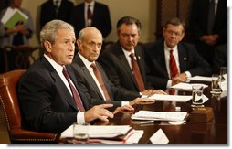 With Secretary Michael Chertoff of the Department of Homeland Security beside him, President George W. Bush speaks to the media in the Roosevelt Room Monday, Sept. 15, 2008, during an update on Hurricane Ike response and relief efforts. White House photo by Eric Draper