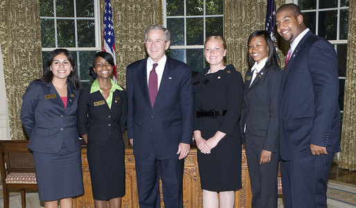 President George W. Bush stands with the 2008 Boys and Girls Clubs of America Regional Finalists for Youth of the Year Monday, Sept. 15, 2008, in the Oval Office of the White House. From left are: Felicia Arriaga, of Hendersonville, N.C.; Shonnetta Henry, of Denver; President Bush; Ashley Turner, of Portland. Ore.; Naquasia Pinchback, of Glen Cove, N.Y., and Jamaal Phillips, of St. Louis. White House photo by Chris Greenberg