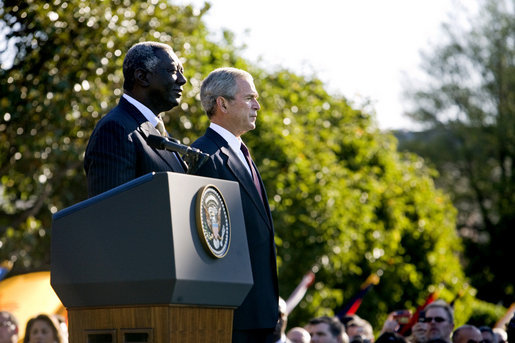 President George W. Bush stands with President John Agyekum Kufuor of Ghana Monday, Sept. 15, 2008, during a South Lawn Arrival Ceremony for the African leader at the White House. White House photo by David Bohrer