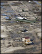 Aboard Marine One, President George W. Bush flies over the devastation left along the Texas coast in the wake of Hurricane Ike. President Bush and officials toured the the Houston-Galveston areas Tuesday, Sept. 16, 2008, for a first-hand look and to participate in briefings from federal, state and local officials on the response to the storm. White House photo by Eric Draper