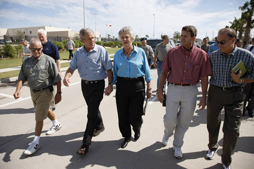 President George W. Bush walks hand-in-hand with Galveston Mayor Lyda Ann Thomas Tuesday, Sept. 16, 2008, during a visit to the Texas area hard hit by last weekend's Hurricane Ike. Walking with them from left are: Charlie Kelly, Emergency Manager Coordinator for the City of Galveston; President Bush, Mayor Thomas, Steve LeBlanc, Galveston City Manager and Texas Congressman Nick Lampson. White House photo by Eric Draper