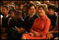 Mrs. Laura Bush and Joe Torsella, President of the National Constitution Center, listen to performance for school children noting the 221st anniversary of the signing of the United States Constitution on Constitution Day. The program, in the East Room of the White House on Sept. 17, 2008, was designed to help make the children more aware of United States History. Mrs. Bush pointed out that Constitution Day is designed to encourage Americans to learn more about our country's founding documents. The performance was part of the six-year-old We the People program created by President George W. Bush. White House photo by Joyce N. Boghosian