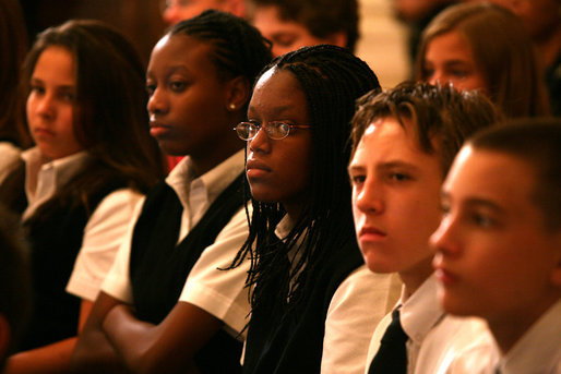 Children listen as Mrs. Laura Bush opens a performance of scenes from the National Constitutions Center's new Freedom Rising performance. The purpose of the event on Sept. 17, 2008 in the White House East Room was to make children more aware of Constitution Day and of United States history. White House photo by Joyce N. Boghosian