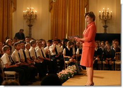 Mrs. Laura Bush welcomes a group of children to the East Room of the White House on Wednesday, Sept. 17, 2008, for an American history performance by the National Constitution Center to highlight the 221st anniversary of the signing of the United States Constitution. White House photo by Joyce N. Boghosian