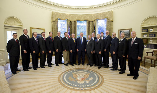 President George W. Bush stands with recipients of the 2008 Secretary of Defense Employer Support Freedom Award during their visit Friday, Sept. 19, 2008, to the Oval Office. The Secretary of Defense Employer Support Freedom Award is the highest award given by the U.S. Government to employers for their exceptional support of their employees who serve in the National Guard or Reserve. This award is presented annually by the Secretary of Defense in recognition of the importance of employer support to our national security. White House photo by Joyce N. Boghosian