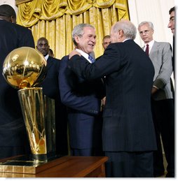 President George W. Bush shakes the hand of Bob Epstein, Managing Partner of the 2008 NBA Championship Boston Celtics Friday, Sept. 19, 2008, at the White House. The Celtics presented President Bush with a team jersey and autographed basketball during their visit. White House photo by Eric Draper