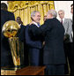 President George W. Bush shakes the hand of Bob Epstein, Managing Partner of the 2008 NBA Championship Boston Celtics Friday, Sept. 19, 2008, at the White House. The Celtics presented President Bush with a team jersey and autographed basketball during their visit. White House photo by Eric Draper