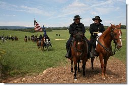 Participants in the re-enactment of the Civil War Battle of Chickamauga gather in Union soldier uniforms on September 19, 2008, for the 145th anniversary of the event in McLemore's Cove, Georgia. Vice President Dick Cheney spoke at the commemoration, calling those who fought an example of "moral valor, bravery, and devotion." The 1863 Civil War battle is often regarded as the last significant victory of the Confederate Army during the Civil War. White House photo by David Bohrer