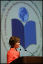 Mrs. Laura Bush address the White House Symposium on Advancing Global Literacy: Building a Foundation for Freedom, which convened at New York City's Metropolitan Museum of Art in New York City, Sept. 22, 2008. With a projection screen display to her side, Mrs. Bush noted that "literacy is at the core of sustainable solutions to the world's greatest problems." Worldwide more than 770 million adults live without literacy skills. White House photo by Chris Greenberg