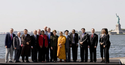 President George W. Bush and Mrs. Laura Bush participate in a photo opportunity with political dissidents Tuesday, Sept. 23, 2008, on Governors Island in New York. President Bush stated in his remarks, "Here in America, we have an obligation to help others realize the blessings of liberty. And so we want to thank you very much for your courage. We thank you for your set of beliefs that remain strong." White House photo by Eric Draper