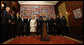 President George W. Bush is surrounded by leaders from the Western Hemisphere as he delivers a statement on free trade Wednesday, Sept. 24, 2008, at the Council of the Americas in New York City. Said the President, "Each of the 11 countries here has a free trade agreement with the United States, or one pending before Congress. Free and fair trade is in our mutual interests." White House photo by Eric Draper