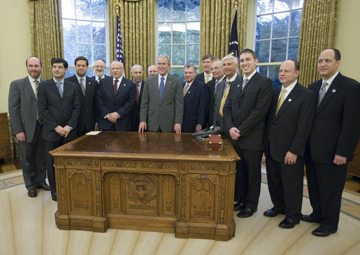 President George W. Bush poses for a photo with Orthodox Union leadership Thursday, Sept. 25, 2008, in the Oval Office of the White House. President Bush met with the Orthodox Union leadership to acknowledge the 110th anniversary of the Orthodox Union's founding, and to wish the Jewish people a Happy New Year. White House photo by Joyce N. Boghosian