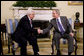 President George W. Bush and President Mahmoud Abbas exchange handshakes Thursday, Sept. 25, 2008, during their visit in the Oval Office of the White House. The leader of the Palestinian Authority thanked President Bush for his efforts to bring peace to the Mideast saying, "Mr. President, I would like to take the opportunity to thank you and thank the United States for the help and the support and the aid that you have given us, and as well as the efforts that you led to mobilize the world to help the Palestinian Authority on the economic front as well as on the security front. Mr. President, we will continue to work with you and we will continue to keep the hope alive in order to reach a political solution for our issue and for the Middle East." White House photo by Eric Draper