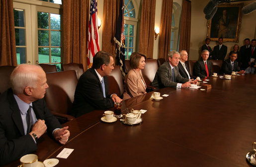 President George W. Bush speaks during a meeting with Bicameral and Bipartisan members of Congress Thursday, Sept. 25, 2008, in the Cabinet Room of the White House. Included in the meeting with the President are, from left: Sen. John McCain, R-Ariz., House Minority Leader John Boehner, R-Ohio, House Speaker Nancy Pelosi, D-Calif.; Senate Majority Leader Harry Reid, D-Nev.; Senate Minority Leader Mitch McConnell, R-Ky., and Sen. Barack Obama, D-Ill. White House photo by David Bohrer