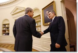 President George W. Bush welcomes Prime Minister Gordon Brown of the United Kingdom to the Oval Office Friday, Sept. 26, 2008, at the White House.  White House photo by Eric Draper