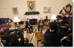 President George W. Bush is joined by Prime Minister Gordon Brown of the United Kingdom during a statement to reporters about their meeting in the Oval Office Friday, Sept. 26, 2008, at the White House. White House photo by Eric Draper