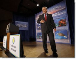 President George W. Bush smiles after delivering his remarks on U.S. Ocean Action Plan Friday, Sept. 26, 2008, at the Smithsonian Museum of Natural History. The U.S. Ocean Action Plan established a coordinated ocean governance structure to enhance leadership and coordination among the Federal agencies with ocean-related responsibilities and activities.  White House photo by Eric Draper