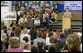 Mrs. Laura Bush addresses the Riverside Elementary School assembly in Bismarck, N.D., Thursday, Oct. 2, 2008, about the National Endowment for the Humanities' Picturing America' program. The program uses iconic artwork - such as the Washington Crossing the Delaware painting displayed nearby - and photography to teach children about architecture, art, and history as they discuss the images. White House photo by Chris Greenberg