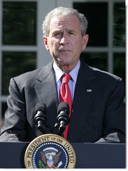 President George W. Bush pauses as he delivers a statement on the Emergency Economic Stabilization Act of 2008 Friday, Oct. 3, 2008, in the Rose Garden of the White House. Said the President, "There were moments this week when some thought the federal government could not rise to the challenge. But thanks to the hard work of members of both parties in both Houses -- and a spirit of cooperation between Capitol Hill and my administration -- we completed this bill in a timely manner." White House photo by Joyce N. Boghosian