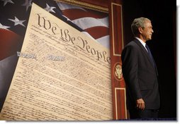 President George W. Bush acknowledges the applause of the audience at his introduction to address a legal conference on judicial accomplishments and philosophy Monday, Oct. 6, 2008, in Cincinnati.  White House photo by Eric Draper