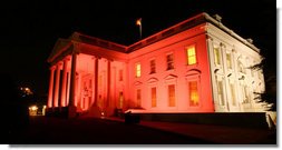 The north side of the the White House turned pink on the evening of Oct. 7, 2008 to raise awareness about breast cancer. The unique view of the North Portico and the side of the house facing Lafayette Park was in observance of Breast Cancer Awareness Month. Breast cancer awareness is a cause Mrs. Laura Bush has worked on around the world. The World Health Organization estimates that each year more than 1.2 million people worldwide are diagnosed with it and breast cancer is one of the leading causes of death for women.  White House photo by Grant Miller