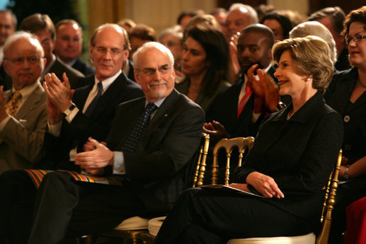 After providing remarks, Mrs. Laura Bush listens from the audience in the East Room of the White House on Oct. 7, 2008, as the 2008 National Medals for Museum and Library Service Ceremony honored five museums and five libraries who have demonstrated outstanding public service. White House photo by Chris Greenberg