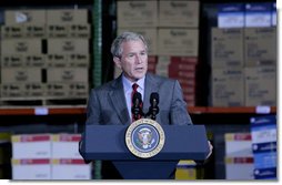 President George W. Bush addresses his remarks on the nation's economy to state and local business leaders Tuesday, Oct. 7, 2008, during his visit to the Guernsey Office Products, Inc. in Chantilly, Va. President Bush said the Emergency Economic Stabilization Act of 2008 will take time to have its full effect in improving the economy.  White House photo by Chris Greenberg