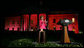 Mrs. Laura Bush applauds after pushing the button to flood the north front of the White House with a sea of pink, in honor of Breast Cancer Awareness Month, on Oct. 7, 2008. Bush addressed breast cancer survivors and advocates and members of the diplomatic corps just before the light display. The First Lady has encouraged worldwide efforts in preventing and curing a disease that is the leading cause of death in women. Each year more than 1.2 million people worldwide are diagnosed with breast cancer. The United States is working with countries in the Middle East, Europe and the Americas to empower women to take control of their health, raise awareness about the importance of prevention and early diagnosis, and support collaborative research to find a breast cancer cure. White House photo by Chris Greenberg