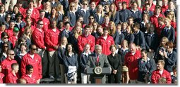 President George W. Bush joined by Mrs. Laura Bush delivers remarks to the members of the 2008 United States Summer Olympic and Paralympic Teams Tuesday, Oct. 7, 2008, on the South Lawn of the White House. The President said in his remarks, "The Olympic and Paralympic teams worked hard to get to this moment. Whether you won a medal or not, it really doesn't matter in the long run. What really matters is the honor you brought to your sports and to your families and to your country."  White House photo by Joyce N. Boghosian