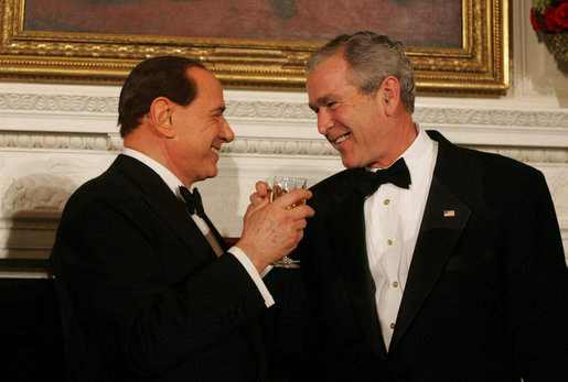 President George W. Bush and Italian Prime Minister Silvio Berlusconi raise their glasses in a toast Monday evening, Oct. 13, 2008, during a State Dinner in honor of Prime Minister Berlusconi's visit to the White House. White House photo by Joyce N. Boghosian