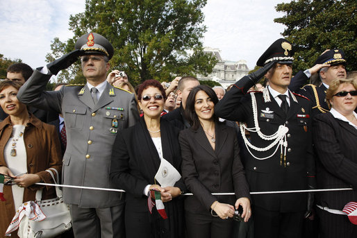 Guests attending the official White House welcome of Italian Prime Minister Silvio Berlusconi watch the ceremony on the South Lawn Monday, Oct. 13, 2008. White House photo by Eric Draper