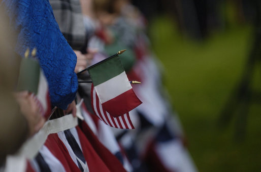 Crowds holding Italian and American flags line up for the arrival ceremony of Italian Prime Minister Silvio Berlusconi Monday, Oct. 13, 2008, to the White House. White House photo by Andrew Hreha