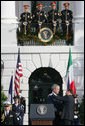 President George W. Bush is embrace by Prime Minister Silvio Berlusconi following President Bush's remarks Monday, Oct. 13, 2008 , welcoming Prime Minister Berlusconi to the White House. White House photo by Chris Greenberg